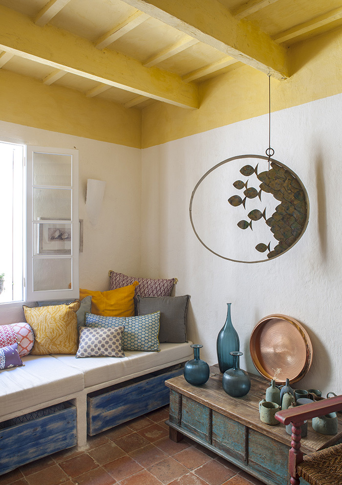 Ciutadella Menorca, Spain: Evelyne Mandel House - Front Room, Living Room - Seat With Cushions - Hanging Sculpture By Menorcan Artist, Vintage Parisian Glass Jars On Coffee Table